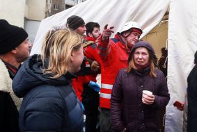 Injured as a result of a rocket attack near the tent, where medics are providing emergency aid