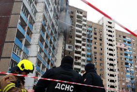Rescuers during the liquidation of the consequences of a rocket attack