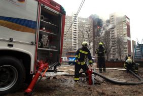 Rescuers during the liquidation of the consequences of a rocket attack