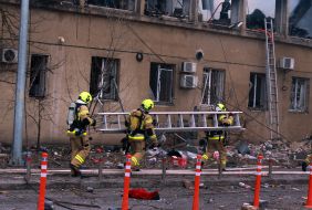 Rescuers during the liquidation of the consequences of a rocket attack
