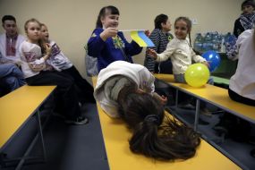 Schoolchildren in the shelter of a Kyiv school