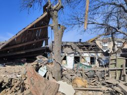 A destroyed house in the city of Mirnograd, Donetsk region