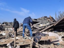 A destroyed house in the city of Mirnograd, Donetsk region