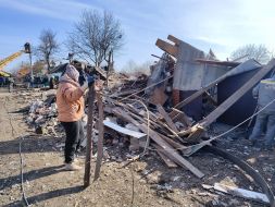 A destroyed house in the city of Mirnograd, Donetsk region