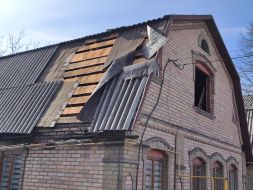 A destroyed house in the city of Mirnograd, Donetsk region