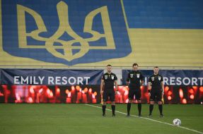 Referees before the start of the match