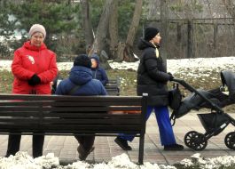 People relax in a park in Kyiv