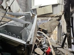 One of the apartments in a residential building after being hit by a Russian missile in the city of Myrnograd, Donetsk region