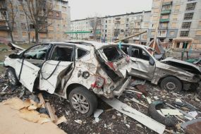 Cars destroyed as a result of shelling by Russian rockets near a residential building in the "Svitly" microdistrict of the city of Myrnograd