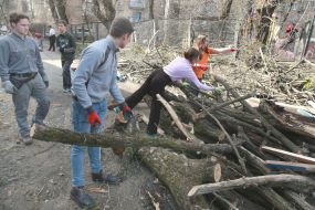 Volunteers clear away the rubble of the Academy of Decorative and Applied Arts building