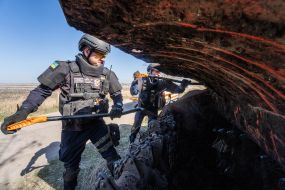 Sapper controls a robotic mine clearing machine