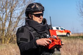 Sapper controls a robotic mine clearing machine