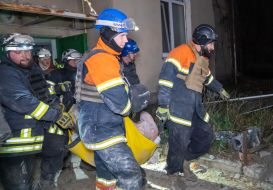 Rescuers carry out the victim