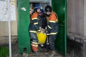 Rescuers carry out the victim