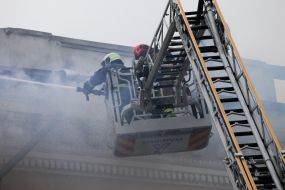 Rescue workers eliminate the consequences of rocket fire in Dnipro