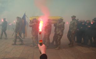 A fire was lit during the farewell to junior sergeant Pavlo Petrichenko near St. Michael's Cathedral in Kyiv