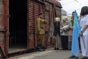 Participants of the performance event for the 80th anniversary of the deportation of the Crimean Tatar people at the railway station in Odessa