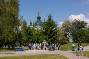 Parishioners near the place where the dismantled UOC chapel stood