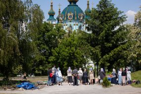 Parishioners near the place where the dismantled UOC chapel stood