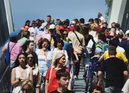 People on the wave pedestrian bridge in Kyiv
