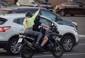 A couple on a motorcycle