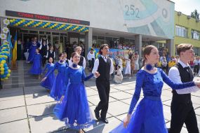 Graduates dance a waltz