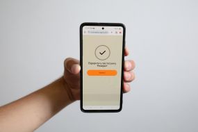 Mobile application "Rezerv+" on the screen of a mobile phone