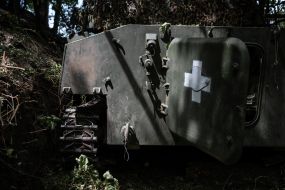 Military personnel set up positions