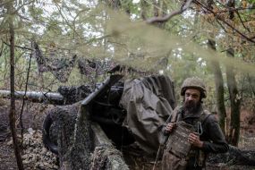 An artilleryman of the 13th brigade of the National Guard "Charter" at advanced positions in the Kharkiv region