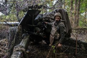 An artilleryman of the 13th brigade of the National Guard "Charter" at advanced positions in the Kharkiv region