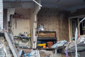 A destroyed apartment in a residential building in Kharkiv