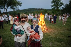Family with children in national Ukrainian costumes