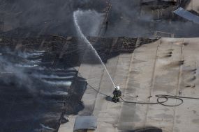 A fire at the warehouses of a trading network as a result of a cruise missile attack in Odesa