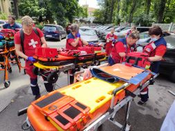 Medical teams near the building of the Okhmatdyt Children's Hospital, which was hit by a rocket