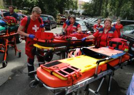 Medical teams near the building of the Okhmatdyt Children's Hospital, which was hit by a rocket