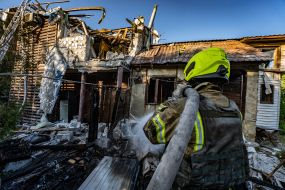 Rescue workers eliminate the consequences of the Russian occupiers' attacks on the private sector in Kharkiv