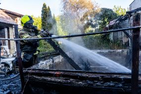 Rescue workers eliminate the consequences of the Russian occupiers' attacks on the private sector in Kharkiv