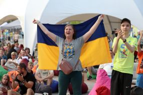 Spectators watch the match of the group stage of the 2024 Olympic Games between the national teams of Ukraine and Morocco in the Olympic fan zone