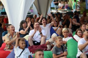 Spectators watch the match of the group stage of the 2024 Olympic Games between the national teams of Ukraine and Morocco in the Olympic fan zone