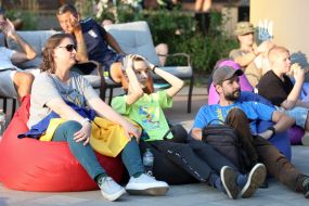 Spectators watch the match of the group stage of the 2024 Olympic Games between the national teams of Ukraine and Morocco in the Olympic fan zone