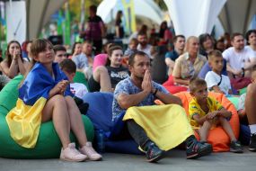 Spectators watch the match of the group stage of the 2024 Olympic Games between the national teams of Ukraine and Morocco in the Olympic fan zone