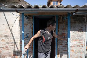 A man near his house