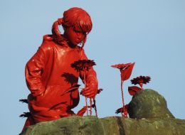 Sculpture "Girl with Sunflowers" by artist James Colomin in Kyiv