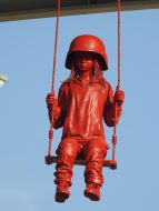 Sculpture "Girl on a swing" by artist James Colomin in Kyiv