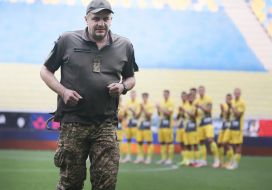 Military on the football field after the match