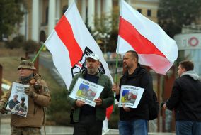 People honor the memory of the fallen Heroes with a moment of silence on Independence Square in Kyiv