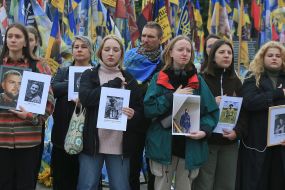 Relatives and friends of the fallen defenders with their portraits honor the memory of the fallen Heroes with a moment of silence on Independence Square in Kyiv