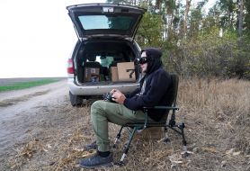A fighter of the 57th brigade tests new drones before going on a mission at positions in the Kharkiv region