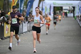 Participants of the "Day 963: Kyiv Marathon of Invincibility" charity race cover the distance on Trukhanovo Island in Kyiv