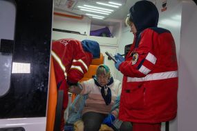 Medics provide assistance to the injured